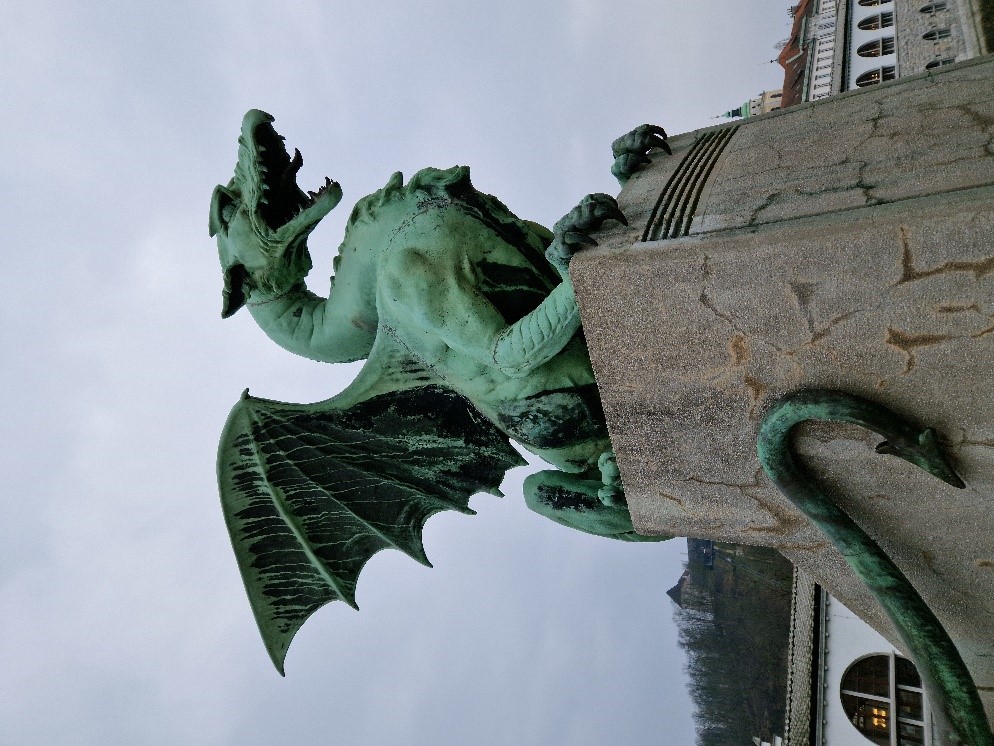 Photo 3. The dragon is the symbol of Ljubljana, and time was given for informal interaction between the instructors and participants during a walking tour of the city to sites including the famous Dragon Bridge.