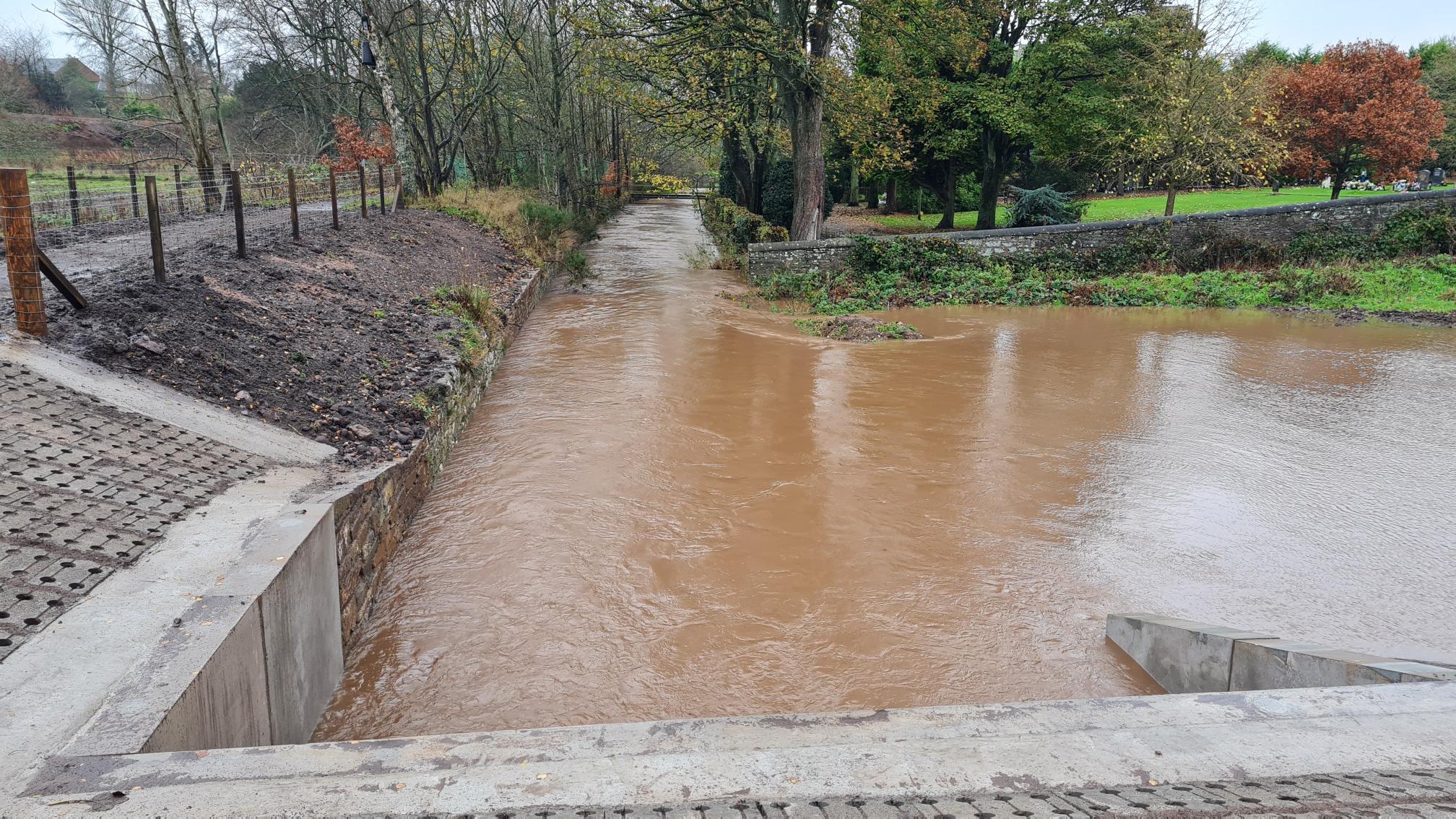 A view of the downstream side of the embankments at the St Vigeans FSA. River levels are controlled and well below the bank levels.